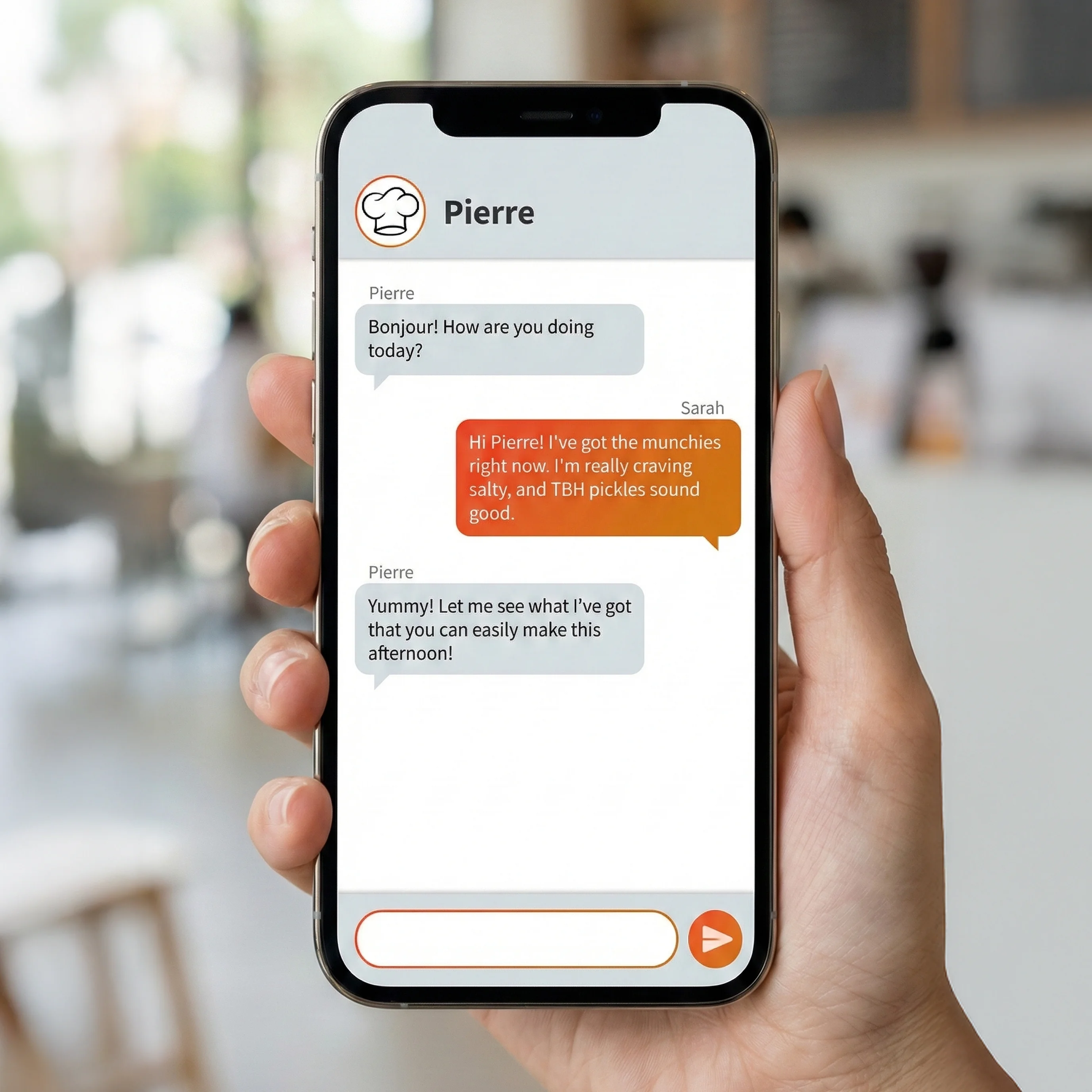 Hand holding smartphone displaying chat conversation with Pierre, GoodSpoon's AI meal planning assistant